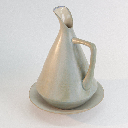 Ceramic pitcher on a white background